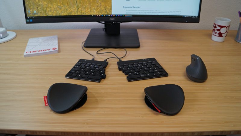 Gleitende Armauflage mit geteilter Tastatur