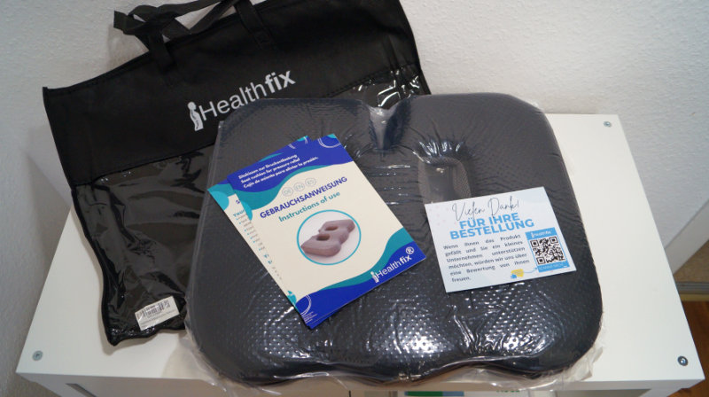 Verpackung: Tragetasche + Kissen + Gebrauchsanweisung – Healthfix® orthopädisches Sitzkissen